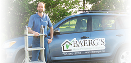 Photo of Dave holding a ladder standing by vehicle. 
        Vehicle has embedded company branding.
